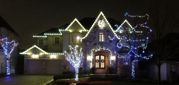 Thornhill Christmas Light Decorations by LawnSavers with Warm white LED minis, Garland, C9 LEDS on Fascia and multi colour minis on trees
